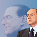 Silvio Berlusconi raffigurato in primo piano e con l'immagine riflessa.